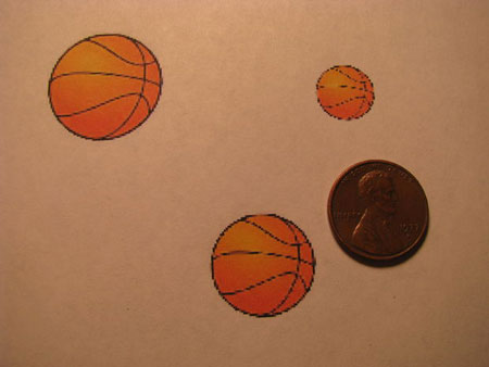 Zet gebogen paperclips op munten 