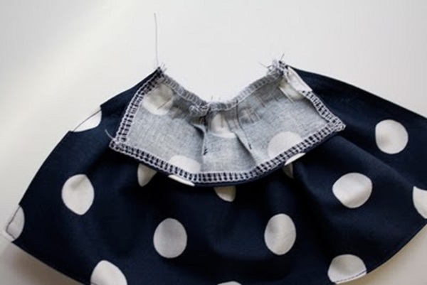 Hoe je poppenkleding met je eigen handen kunt naaien