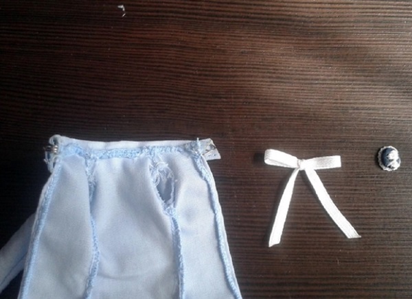 Hoe je poppenkleding met je eigen handen kunt naaien