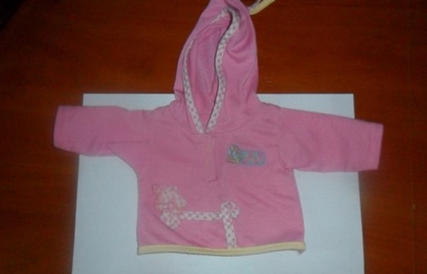 Hoe je poppenkleding met je eigen handen kunt naaien