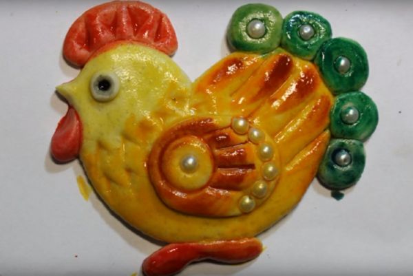 Rooster met zijn eigen handen