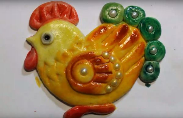 Rooster met zijn eigen handen