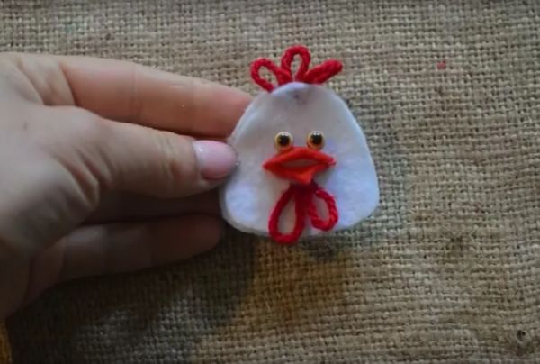 Rooster met zijn eigen handen