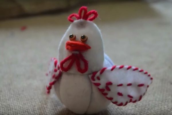 Rooster met zijn eigen handen