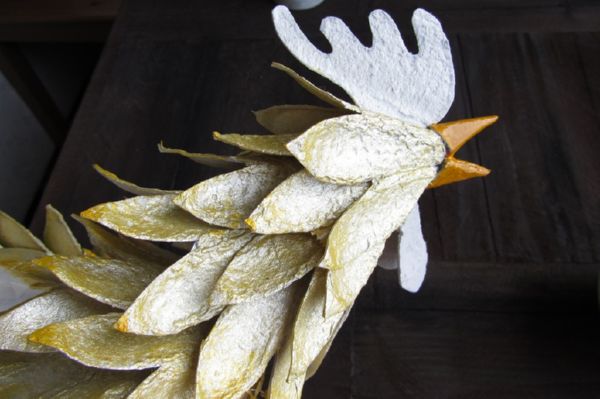 Rooster met zijn eigen handen