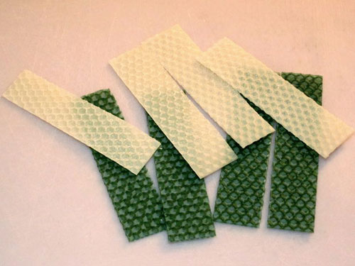 Neem 4 witte stroken was en 4 groen