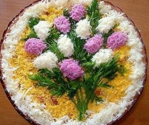 Decoratie van salades voor de nieuwjaarse geiten 