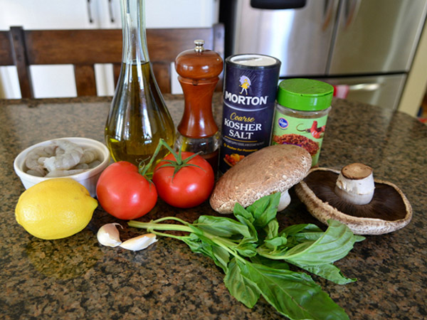 Gegrilde champignons met tomaat en garnalen vulling, heerlijk recept