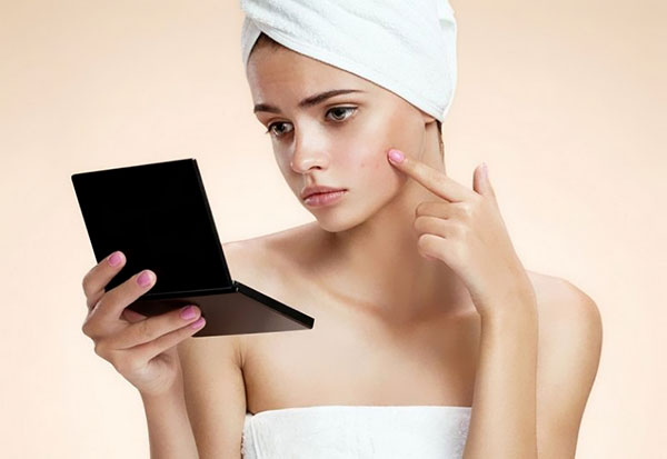 Stop met acne: een menu voor een gezonde huid